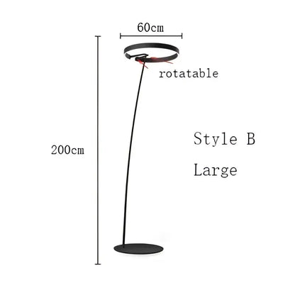 Black metal floor lamp with circular head and slender curved base from decorbites circular luminescence led series
