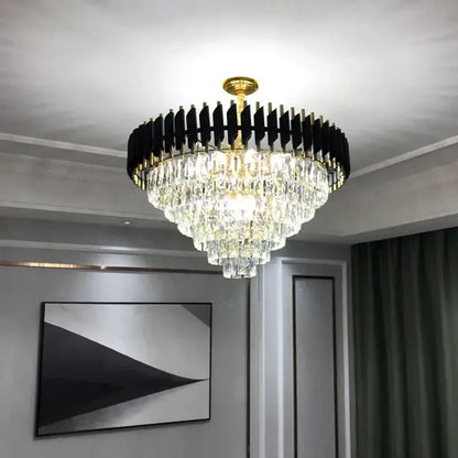 Modern black and gold crystal led pendant chandelier with gold frame, clear prisms, and matte black slats for dining room decorbites crystal led