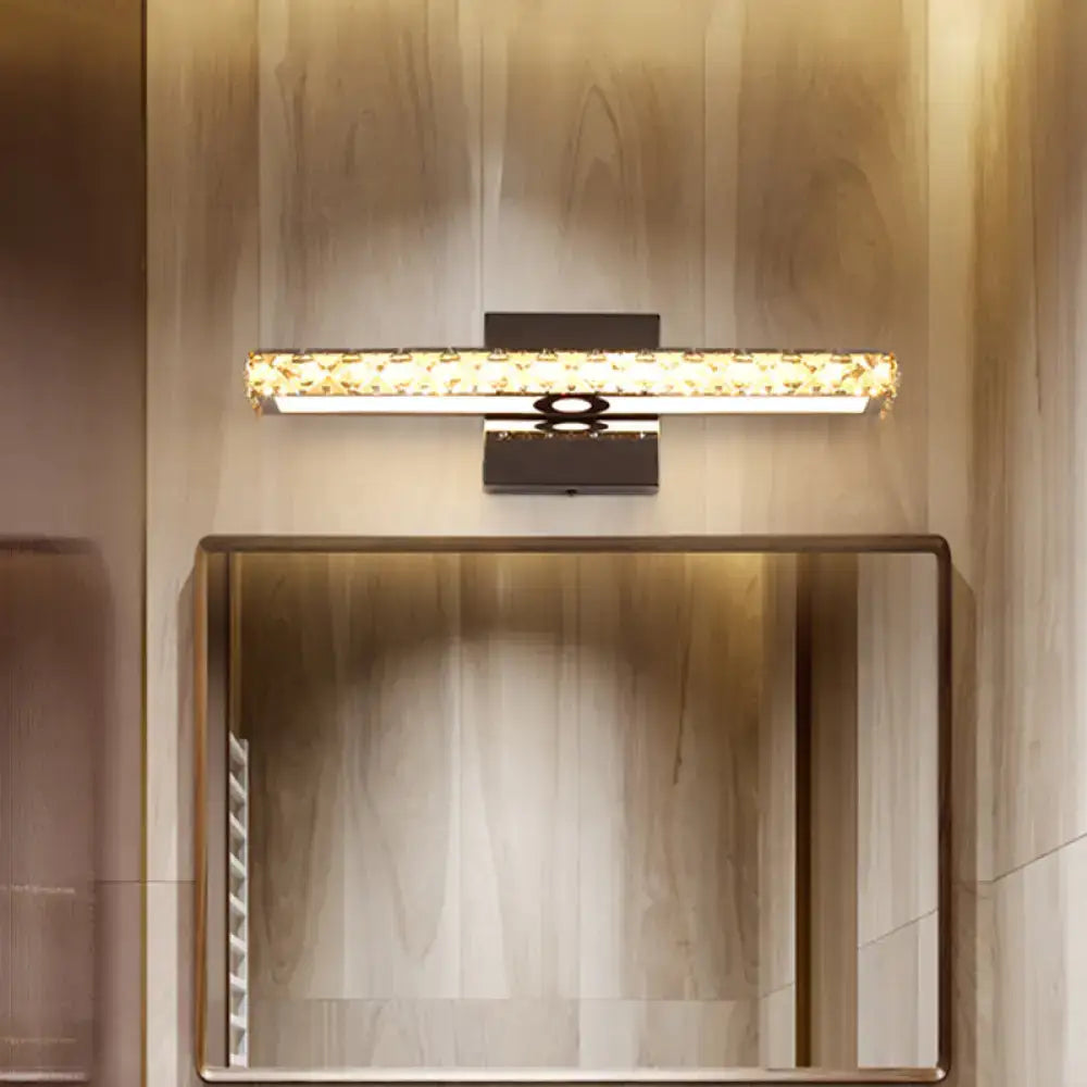 Modern black and gold crystal led wall light with sleek metal frame and embedded golden crystal accents for bathroom use