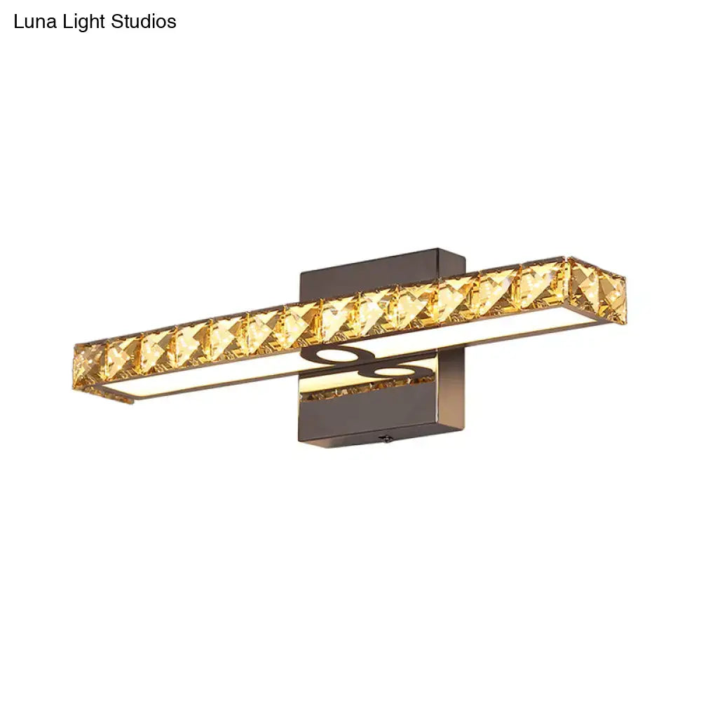 Modern black and gold crystal led wall light with dark bronze finish and faceted golden crystal accents