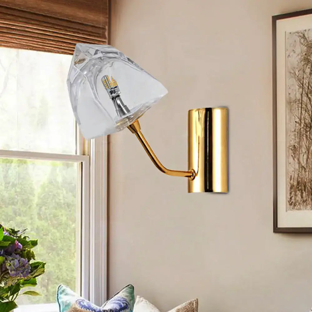 Modern black and gold faceted glass wall sconce with gold-toned fixture, clear shade, bulb base, fixture height, and backplate width
