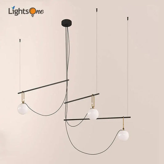 Modern black and gold glass ball pendant lights with three white glass globes for dining room decorbites chandelier
