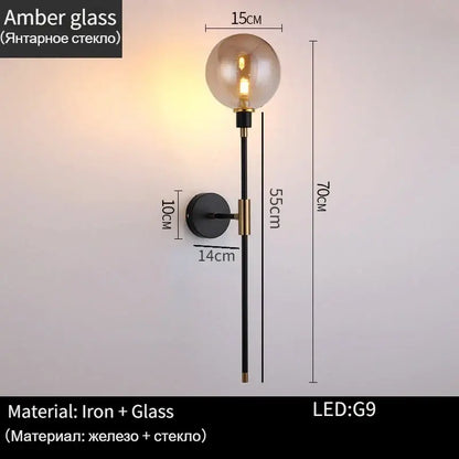 Modern black and gold glass ball wall lamp with amber glass bulb and iron stem for living room decorbites wall lamp