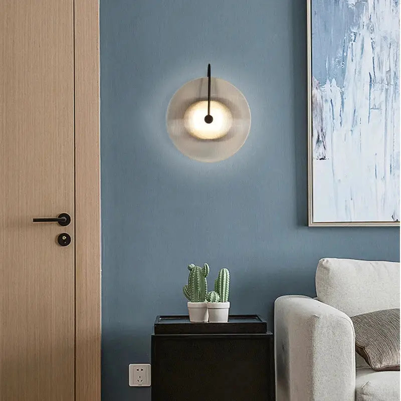 Modern black and gold glass stripe wall lamp with frosted glass disc and metal arm for bedroom decorbites glass stripe