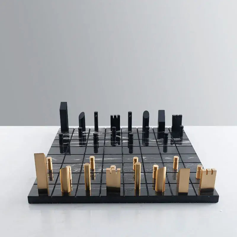 Modern black and gold metal marble chessboard with sleek minimalist pieces for living room decorbites golden metal style