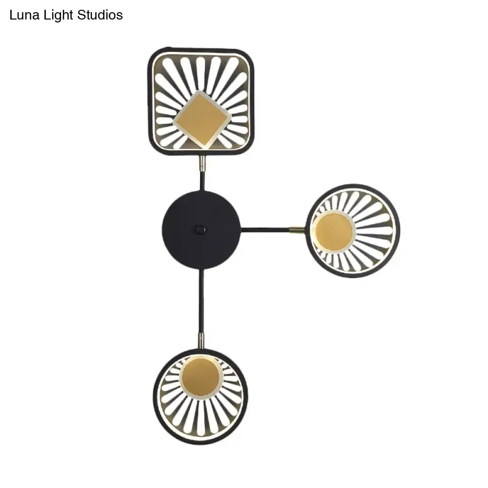 Modern black and gold sunburst led wall sconce with geometric design and three radiating light fixtures 18 inches fixture