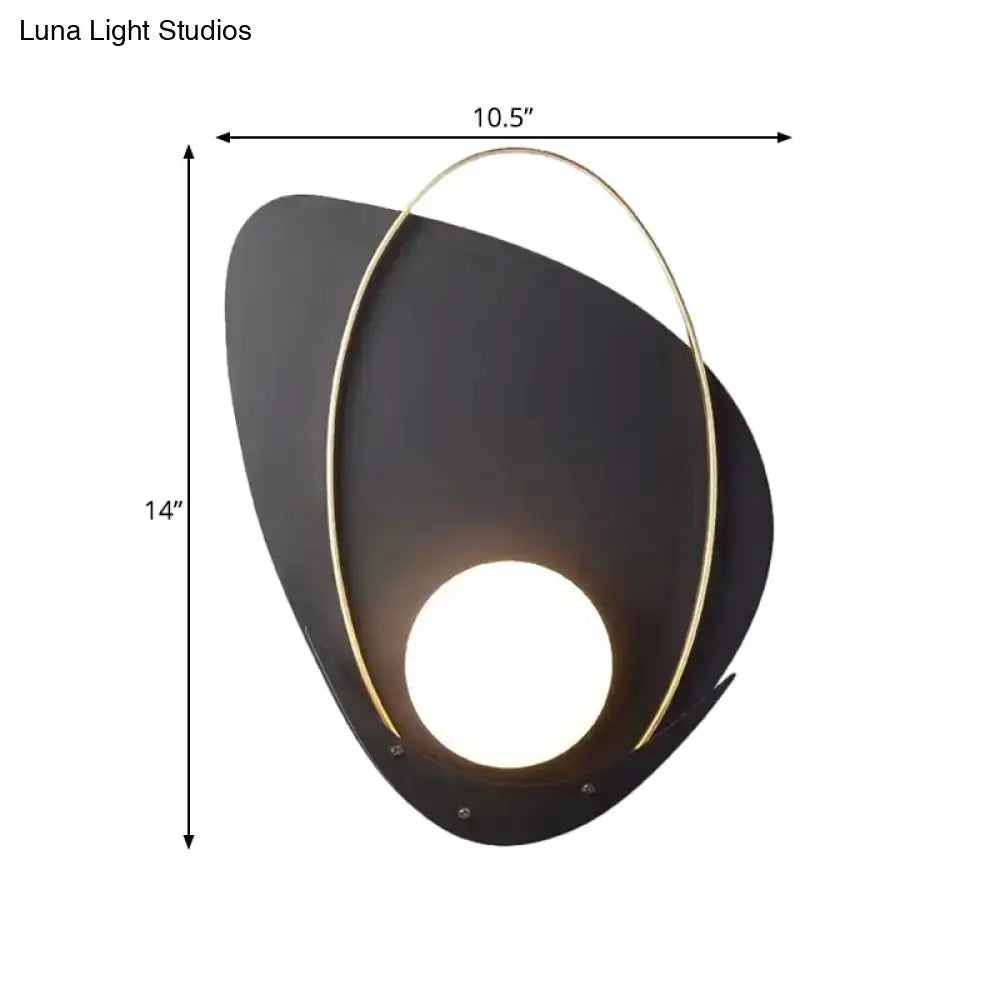Modern black and gold wall lamp with white glass shade and illuminated central light for bedroom sconce lighting