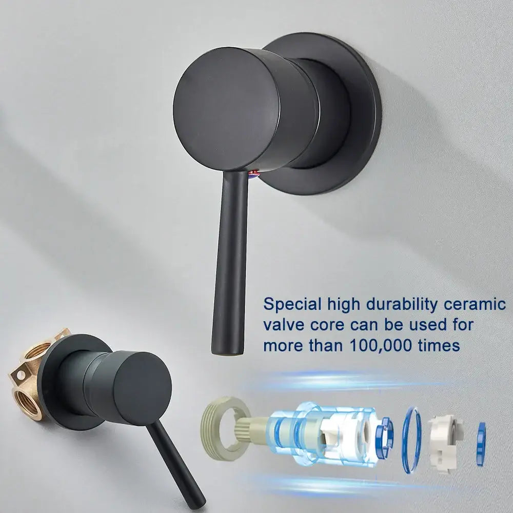Modern black and gold wall mounted basin faucet with black matte finish cylindrical handle and circular base