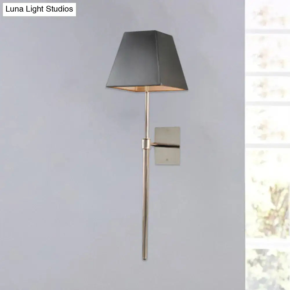 Modern sconce light with a sleek brushed brass finish and dark gray fabric shade direct wired electric 110v-120v