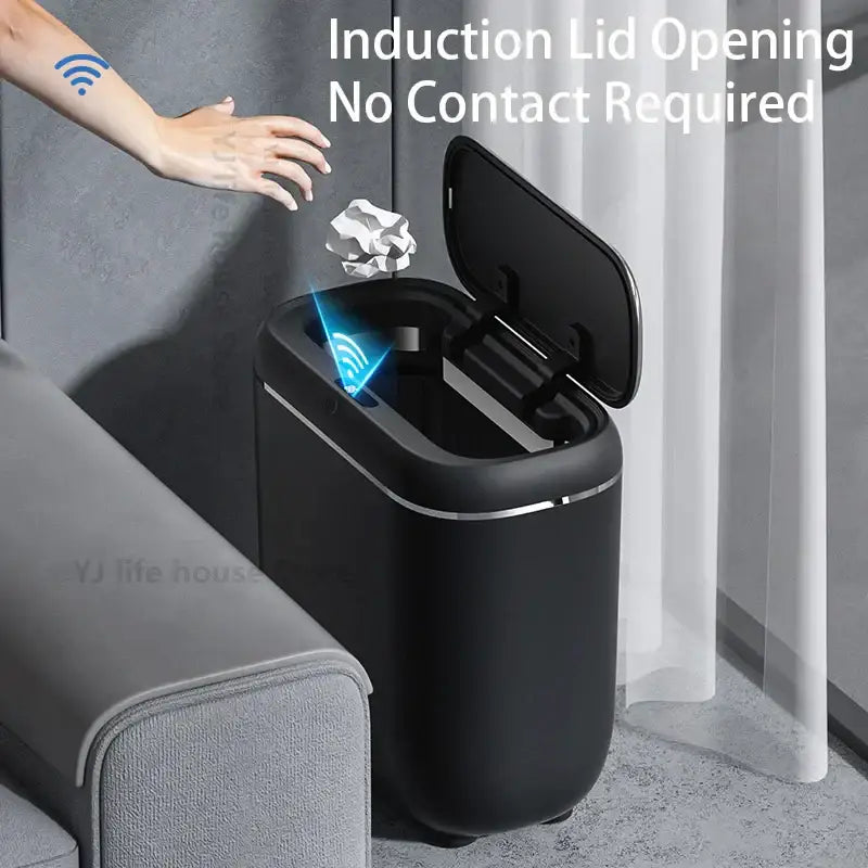 Modern black and silver automatic sensor trash can with sleek metallic trim and wireless lid opening feature