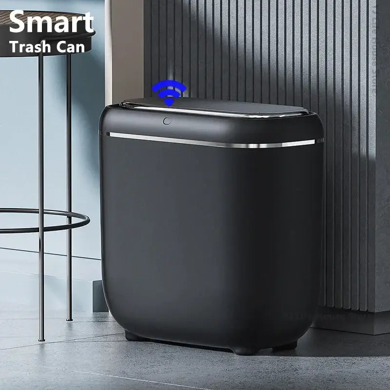 Modern black and silver automatic sensor trash can with sleek design and silver accent trim for kitchen use