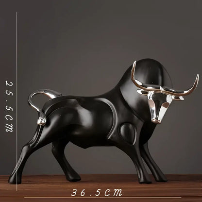 Modern black and silver decorbites bull sculpture with polished metallic horns and tail for living room decor