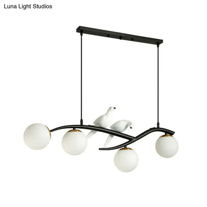 Black metal dining room island light pendant with four frosted glass globes ceramic bird accents adjustable cord length