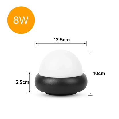 Compact two-toned led wall lamp with smooth white dome and black base ideal for bedroom and garden lighting solution
