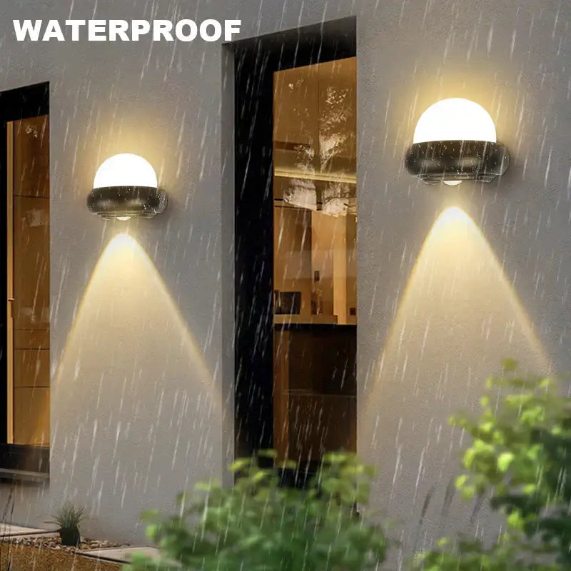 Modern black and white dome led wall lamp with sleek metal base and translucent diffuser for bedroom and garden use