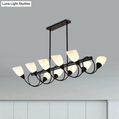 Modern black metal light fixture with seven frosted white glass shades in a curved design kitchen pendant light