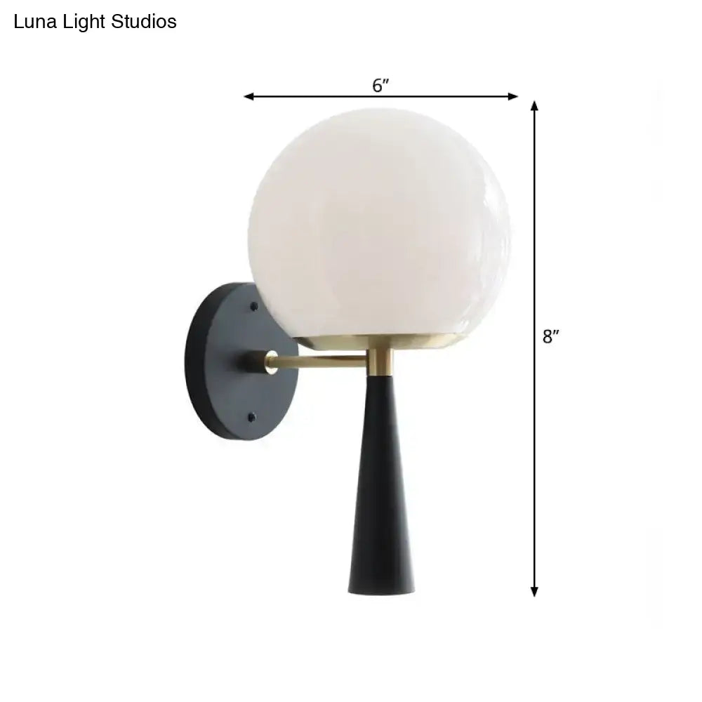 Modern black and white glass wall sconce light fixture with frosted white glass shade and brass hardware for 220v-240v use