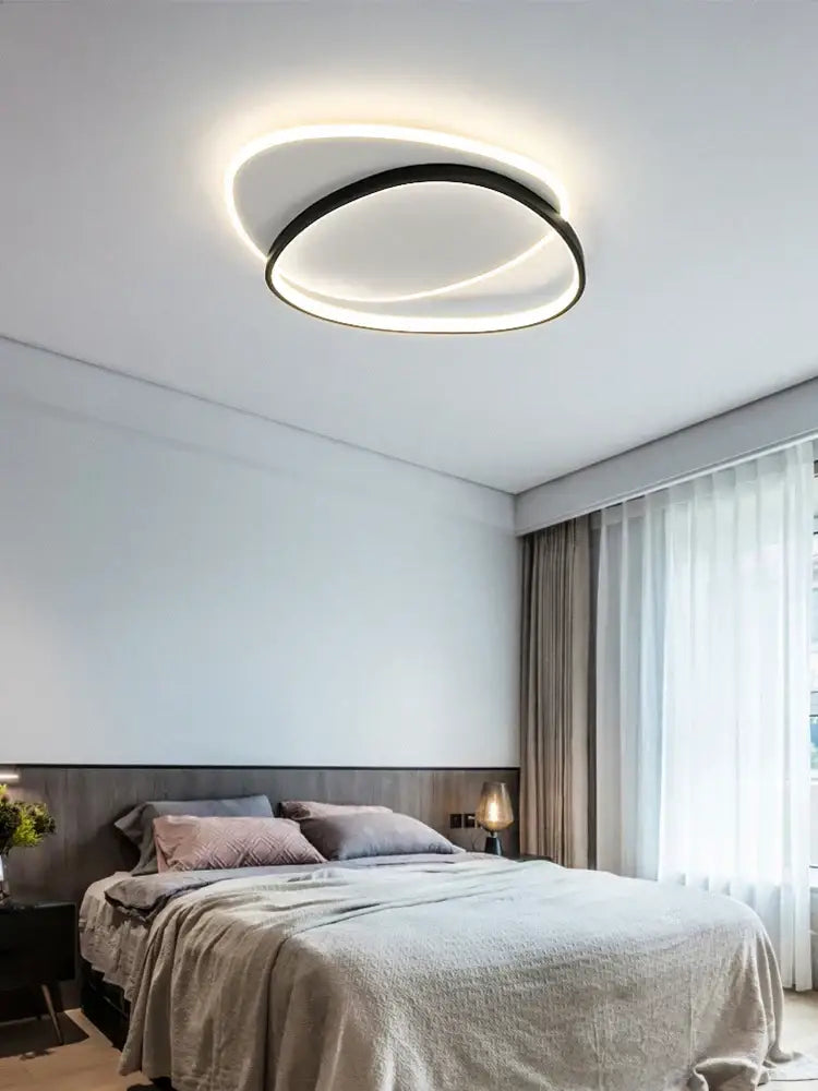 Modern black and white led ceiling lamp with sleek black ring and glowing white illumination for bedroom decorbites led ceiling