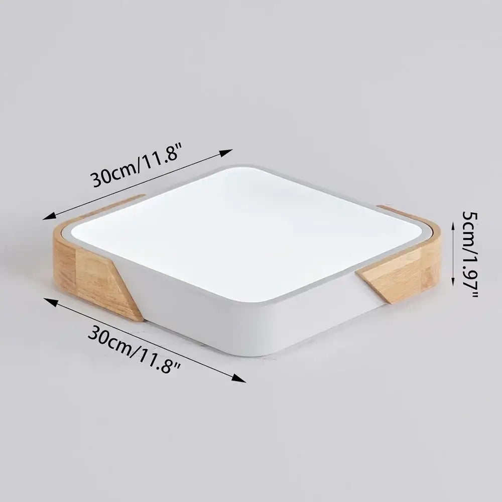White rectangular led table lamp with light wood accents complementing modern black and wood decorbites led ceiling light