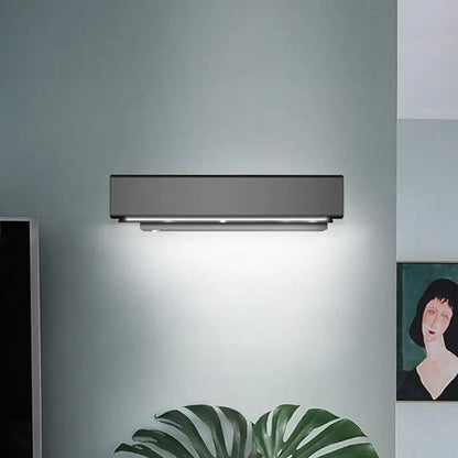 Modern matte gray wall-mounted led sconce lamp with sleek rectangular design and integrated led strip for bedroom use