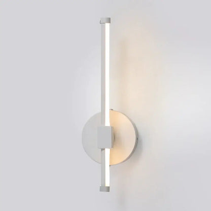 Modern white led wall light with sleek vertical bar and circular base for decorbites indoor led bedroom decor