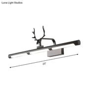 Modern black antler accent led wall lamp with a sleek black finish and textured metal deer-head vanity light design