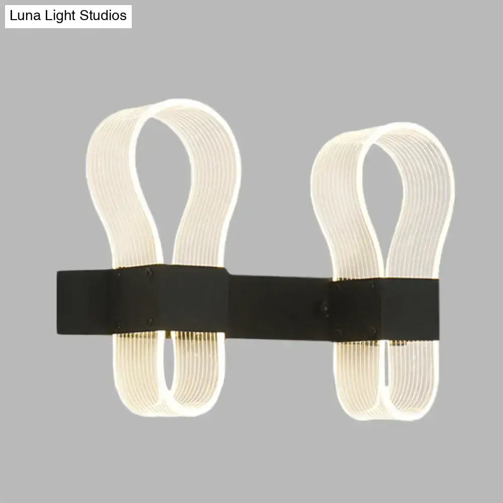 Modern black arc ring sconce wall lamp with two curved ribbed white LED fixtures on a sleek black horizontal bar