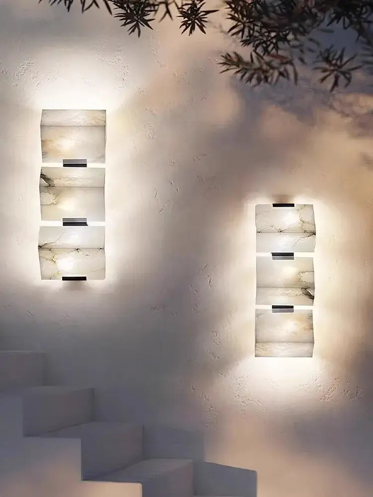 Modern black art deco marble led wall light bedroom sconce with sleek white marble and black horizontal accents decorbites art deco