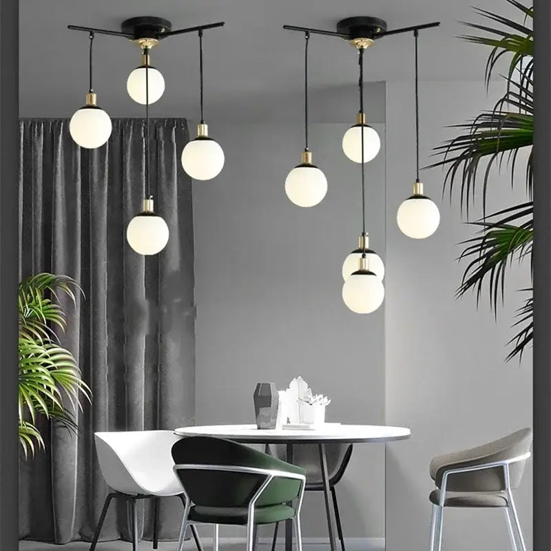 Modern black art glass ball molecule chandelier with frosted glass globes and brass accents for living room decorbites art glass