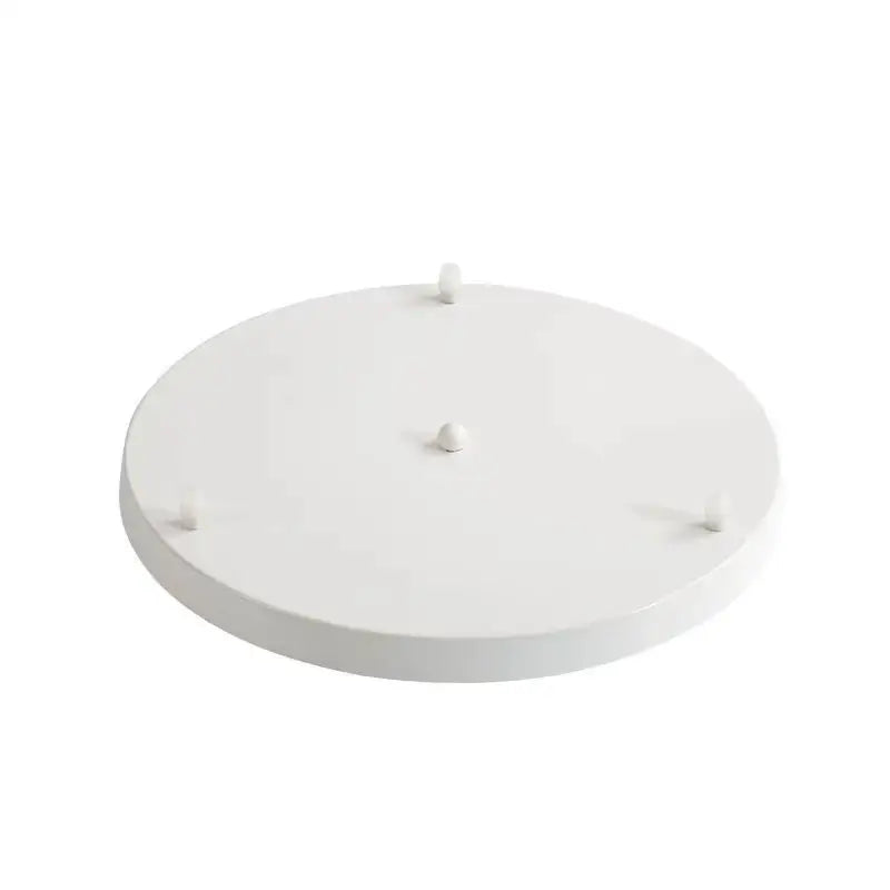 White circular mounting base plate lighting accessory with four small feet for modern black display stand use