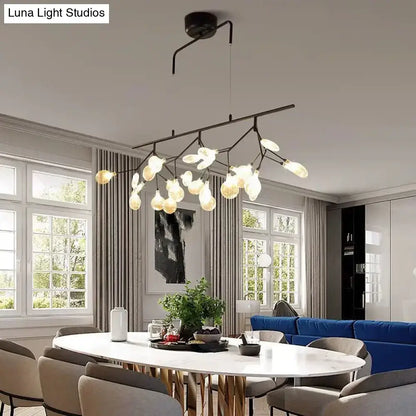 Modern black branching chandelier with frosted glass globe bulbs designed for elegant dining room lighting