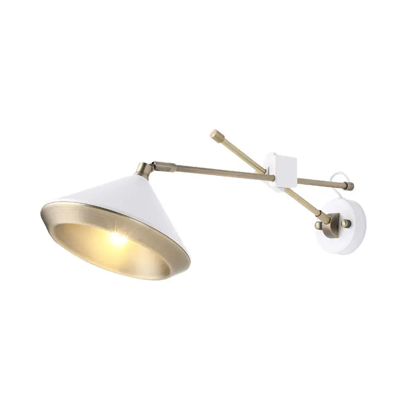 Modern black and brass wall light with adjustable arm and conical white and brass shade for bedroom with bulb base