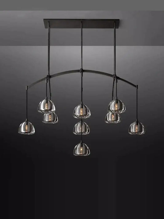 Modern black brass american series led chandelier with clear glass globe shades for dining room decorbites black brass