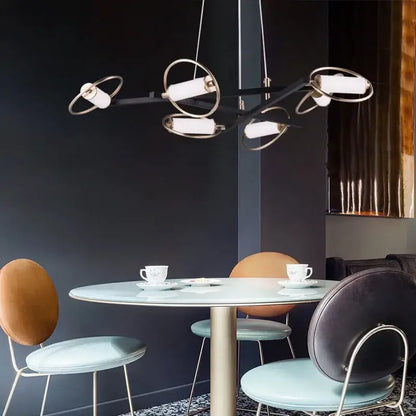 Modern black and brass circular ring LED chandelier with white cylindrical lights for dining room decorbites circular ring