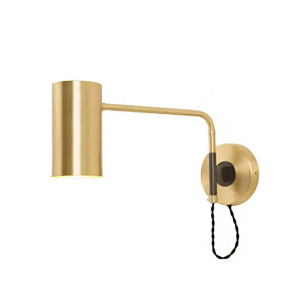 Modern black and brass curved arm wall lamp with adjustable fixture height and cylindrical shade for bedroom lighting