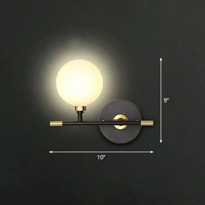 Modern black and brass wall lamp with frosted glass globe ball bedside sconce for bedroom wall mounted light