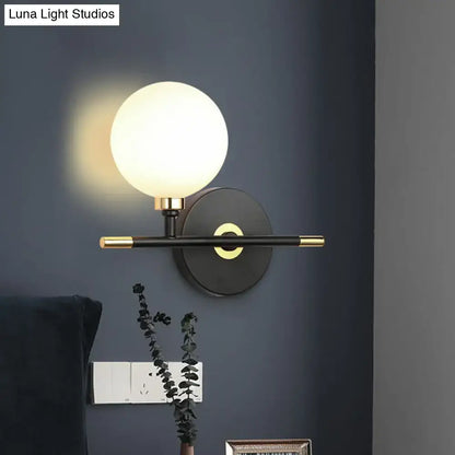 Modern black and brass wall lamp with frosted glass globe ball bedside sconce for bedroom wall mounted light