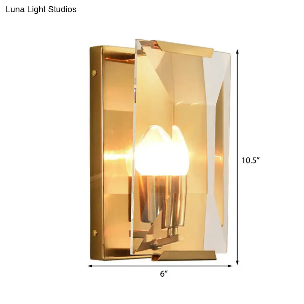 Modern black brass sconce light with gold finish clear geometric acrylic shade and exposed brass hardware for bedroom use