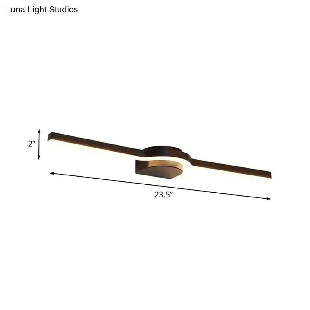 Modern black and brass slim line led vanity light with sleek black and gold finish and two elongated arms emitting white warm light