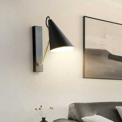 Modern black and brass tapered conical wall sconce with articulated arm for dining room 110v-120v and 220v-240v use