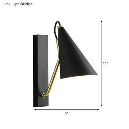 Modern black and brass tapered wall sconce with articulated arm for dining room 110v-120v and 220v-240v lighting