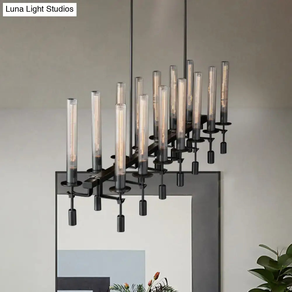 Modern black brass tube island chandelier featuring multi-light clear glass tubes with glowing filament LED bulbs