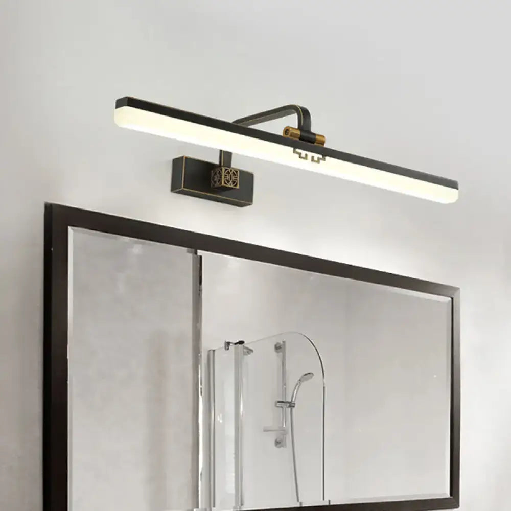 Modern black and brass wall vanity light with a sleek rectangular design for light metallic mirror bathroom cabinets