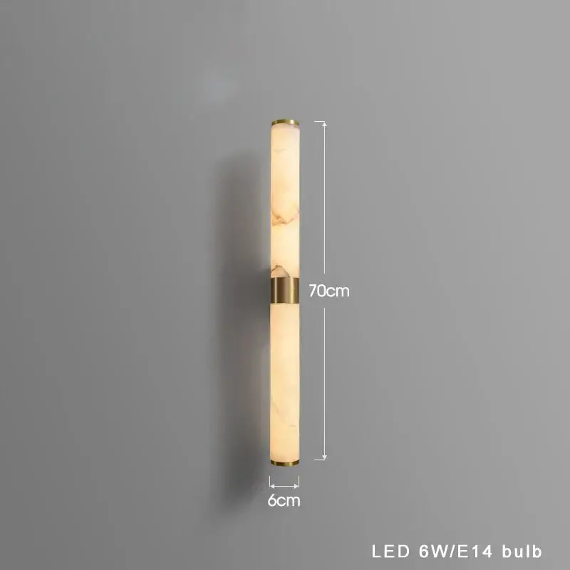 A sleek 70cm tall modern black bronze alabaster wall light with warm marble-like body and black bronze brass accents for decorbites wall lights