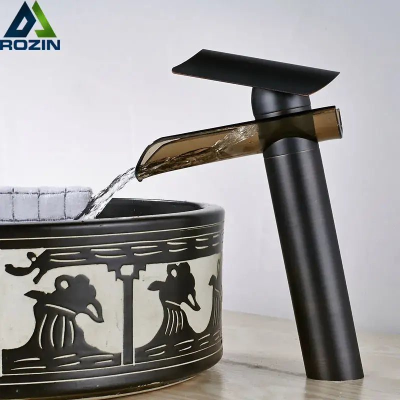 Modern black bronze glass waterfall tap with black matte finish and amber-tinted glass spout for bathroom countertop decorbites black bronze
