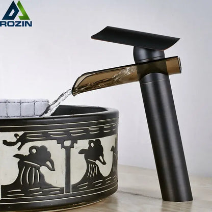 Modern black bronze glass waterfall tap with black matte finish and amber-tinted glass spout for bathroom countertop decorbites black bronze