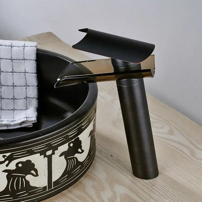 Modern black bronze glass waterfall tap bathroom countertop faucet with matte black finish and brushed metal accents