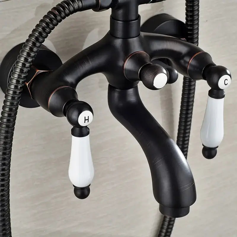 Modern black bronze and white shower faucet set with black matte faucet and ceramic handles marked h and c