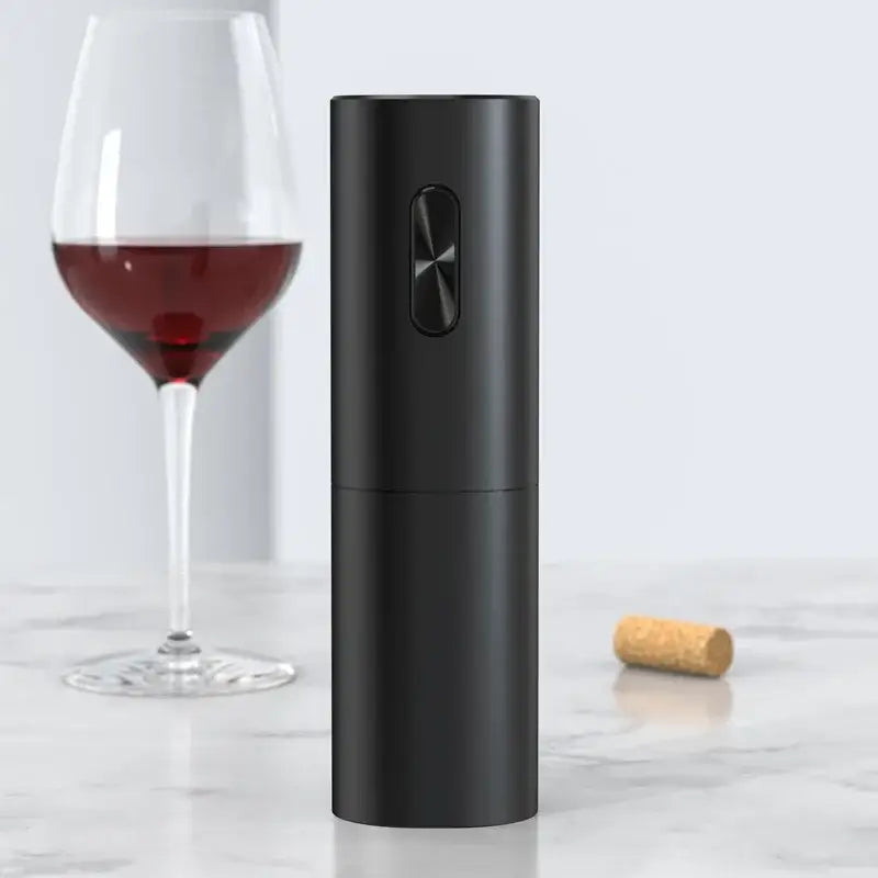 Modern black electric wine opener with brushed metal accent on side button for kitchen use