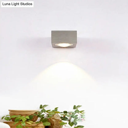 Modern minimalist wall-mounted rgb lighting piece in matte gray metal with brushed silver accents for corridor use